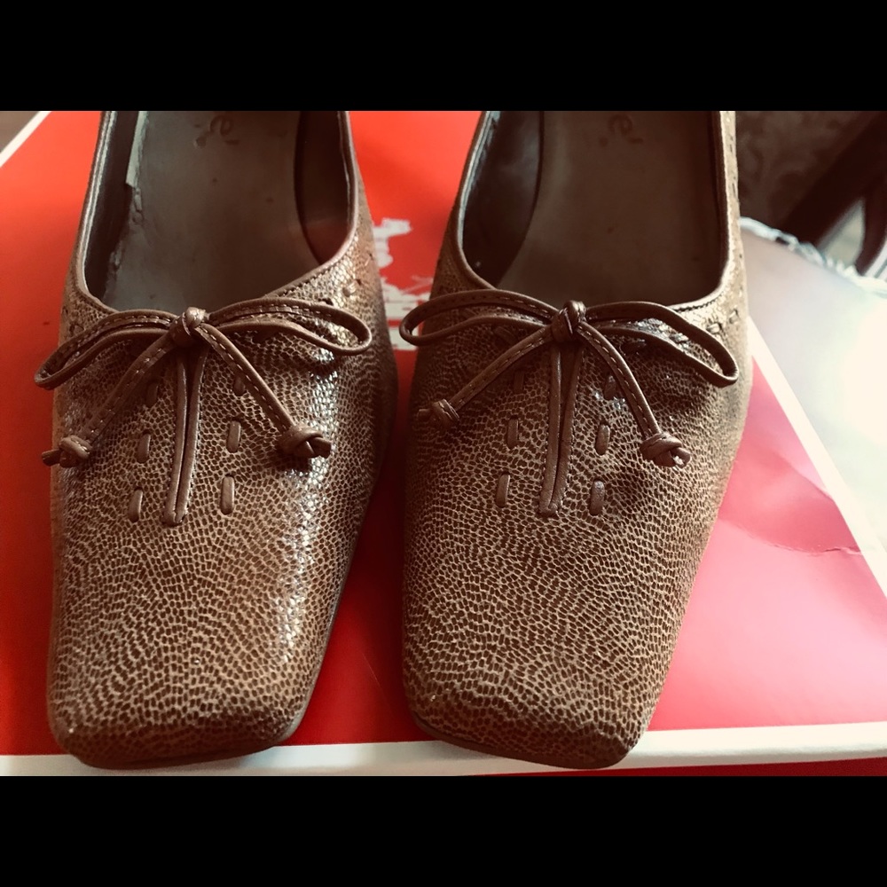Dressy low heel soft leather shoes.